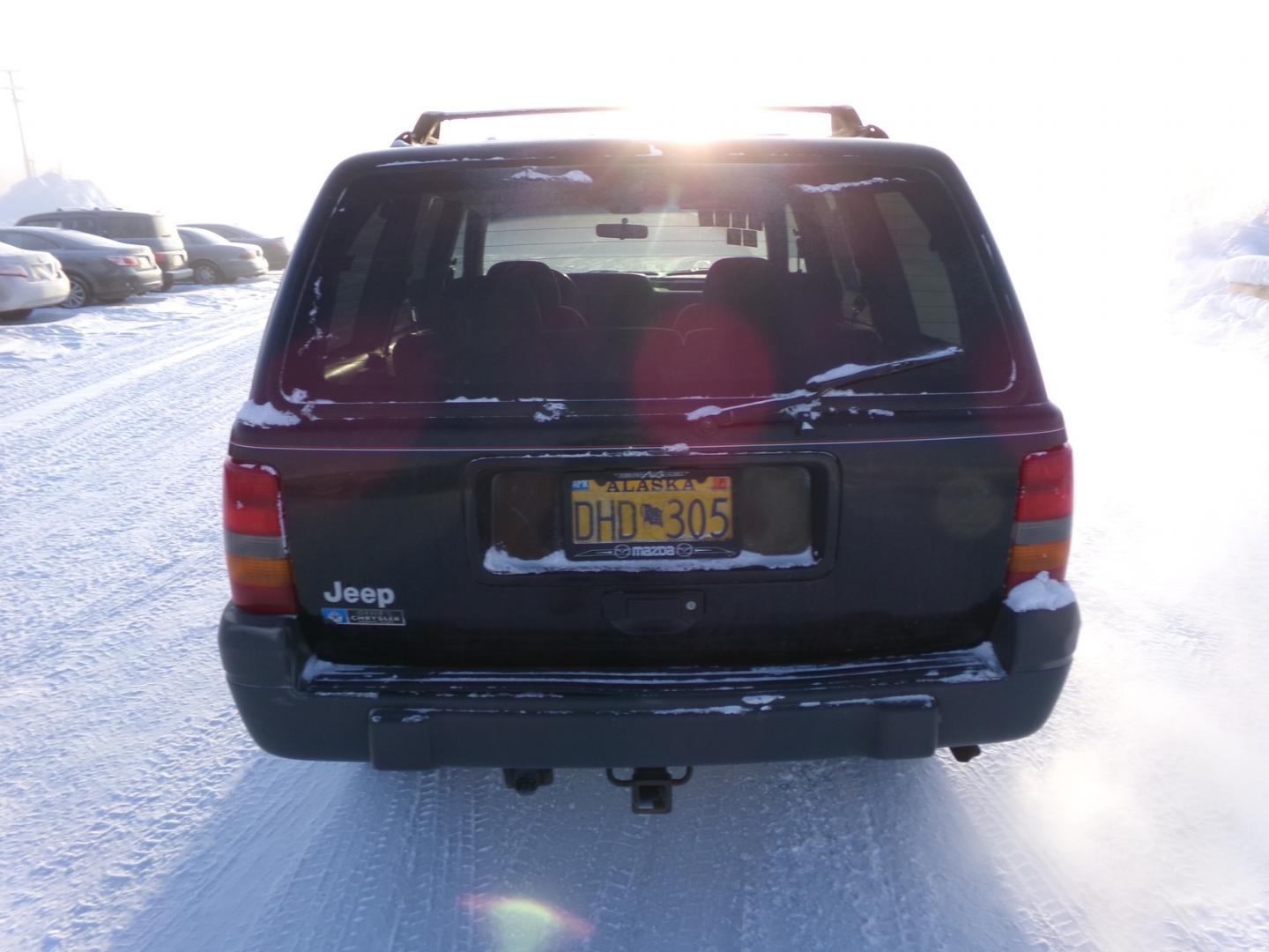 1997 Black Jeep Grand Cherokee Laredo 4WD (1J4GZ58S6VC) with an 4.0L L6 OHV 12V engine, 4-Speed Automatic Overdrive transmission, located at 2630 Philips Field Rd., Fairbanks, AK, 99709, (907) 458-0593, 64.848068, -147.780609 - Photo#3